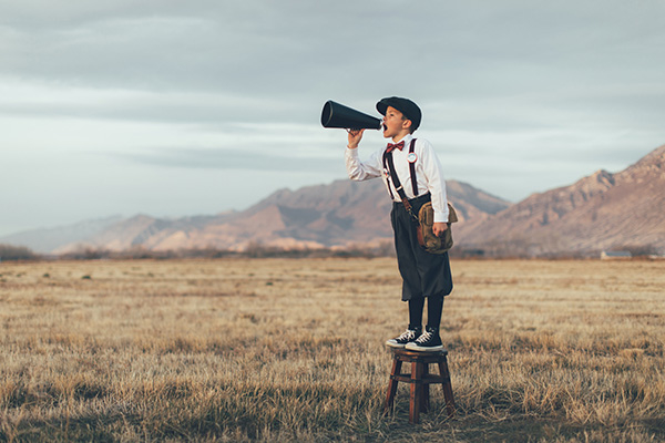 Image of a child shouting an alert