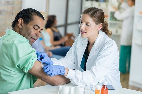 A patient receiving a vaccination