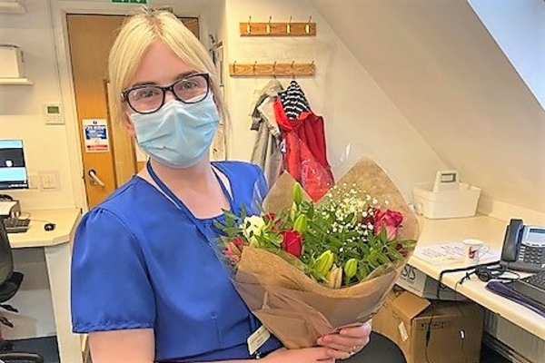 Shannon and flowers